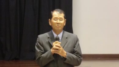 寄付金の呼びかけをする前田会長