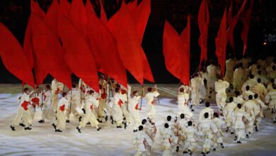 日の丸をあしらった衣装で日本移民を演じる様子（Foto: Fernando Frazao/Agencia Brasil）