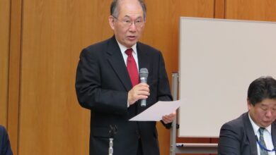 講演する海外日系人協会の田中克之理事長（昨年10月の海外日系人大会で撮影）